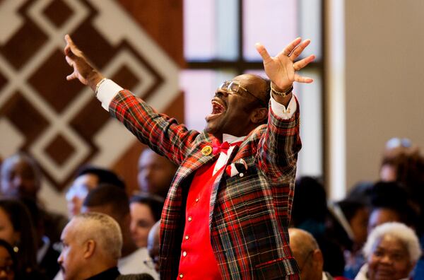 Cail Merrell, otherwise known as "The Happy Preacher," shouts out during during the Rev. Martin Luther King Jr. holiday commemorative service at Ebenezer Baptist Church where King preached, Monday, Jan. 18, 2016, in Atlanta. (AP Photo/David Goldman)