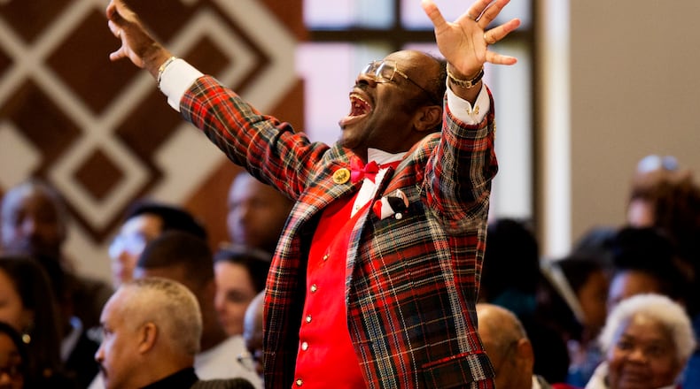 Cal Merrell, otherwise known as "The Happy Preacher" and whose last name was sometimes spelled Murrell by others, shouts out during during the Rev. Martin Luther King Jr. holiday commemorative service at Ebenezer Baptist Church where King preached, Monday, Jan. 18, 2016, in Atlanta. (AP Photo/David Goldman)