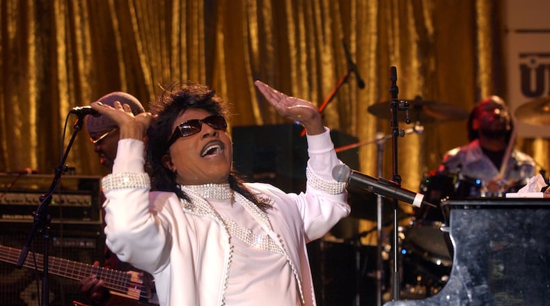 Little Richard brings in 2003 at Underground Atlanta’s 17th annual Peach Drop on Tuesday, Dec. 31, 2002. The Macon native and music icon died Saturday, May 9. (BARRY WILLIAMS/AJC FILE PHOTO)