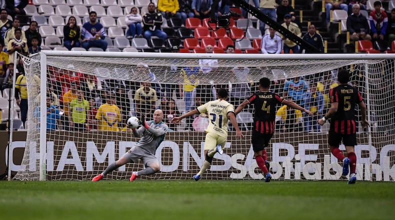 Atlanta United goalkeeper Brad Guzan #1 saves the ball during the first half of the first leg match between Atlanta United FC and Club America in the quarterfinal round of the 2020 Scotiabank Concacaf Champions League at Estadio Azteca in Mexico City, Mexico, on Wednesday March 11, 2020. (Photo by Jacob Gonzalez/Atlanta United)