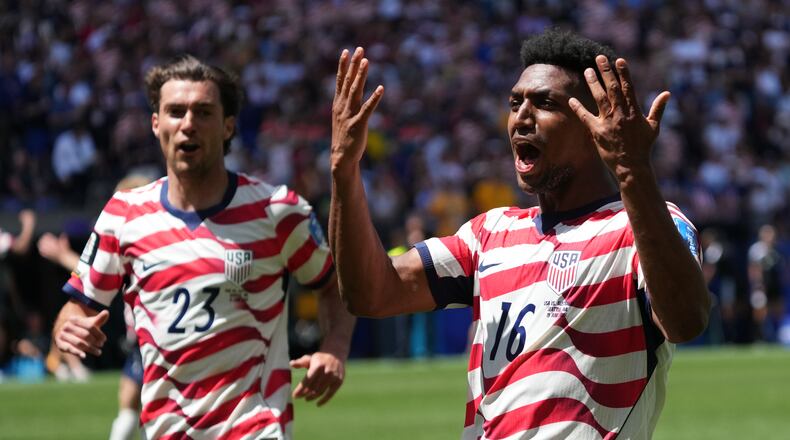 United States' Joe Scally (23) and Alex Freeman (16) react after the World Cup Group D soccer match between the United States and Australia in Seattle, Friday, June 19, 2026. (AP Photo/Ted S. Warren)