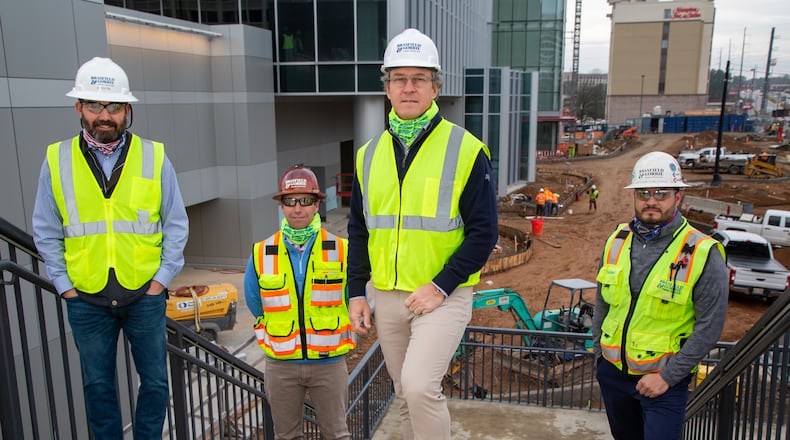 (left to right) Portrait of Jim Sexton, Wes Murrell, Keith Johnson & Victor Saldana of Brasfield & Gorrie Construction at the Thyssen Krupp elevator test tower site in Atlanta on Friday January 22, 2021. For a story on the Top Workplace large category.PHIL SKINNER FOR THE ATLANTA JOURNAL-CONSTITUTION.