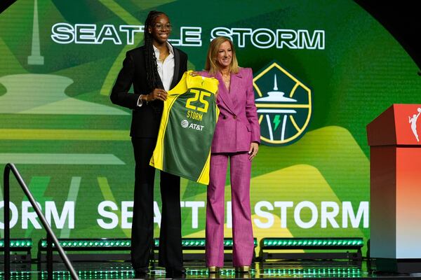 Dominique Malonga, left, poses with WNBA commissioner Cathy Engelbert after being selected second overall by the Seattle Storm during the first round of the WNBA basketball draft, Monday, April 14, 2025, in New York. (AP Photo/Pamela Smith)