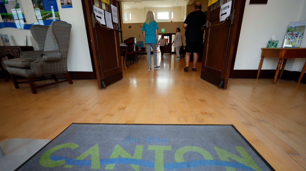 Polling workers and voters are observed inside Canton City Hall during the special election for the state senate seat in Cherokee on Tuesday, August 26, 2025, to fill the remainder of former state Sen. Brandon Beach’s term, which runs through January 2027. (Miguel Martinez/AJC)
