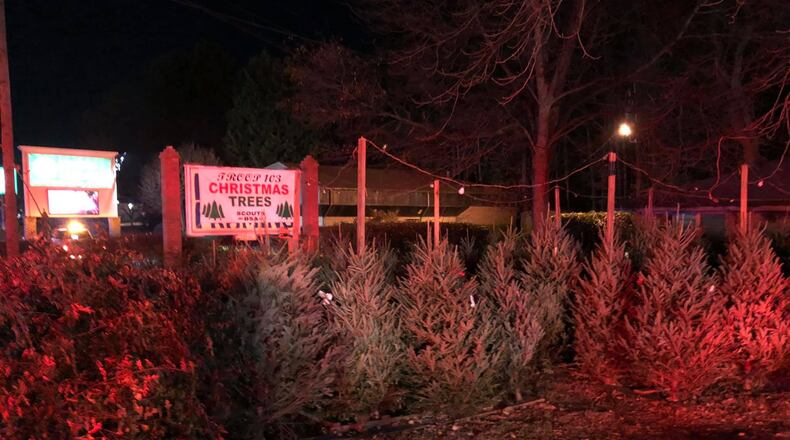 The fire spread to a few Christmas trees, but most are still usable for the holidays, according to a DeKalb County fire official.