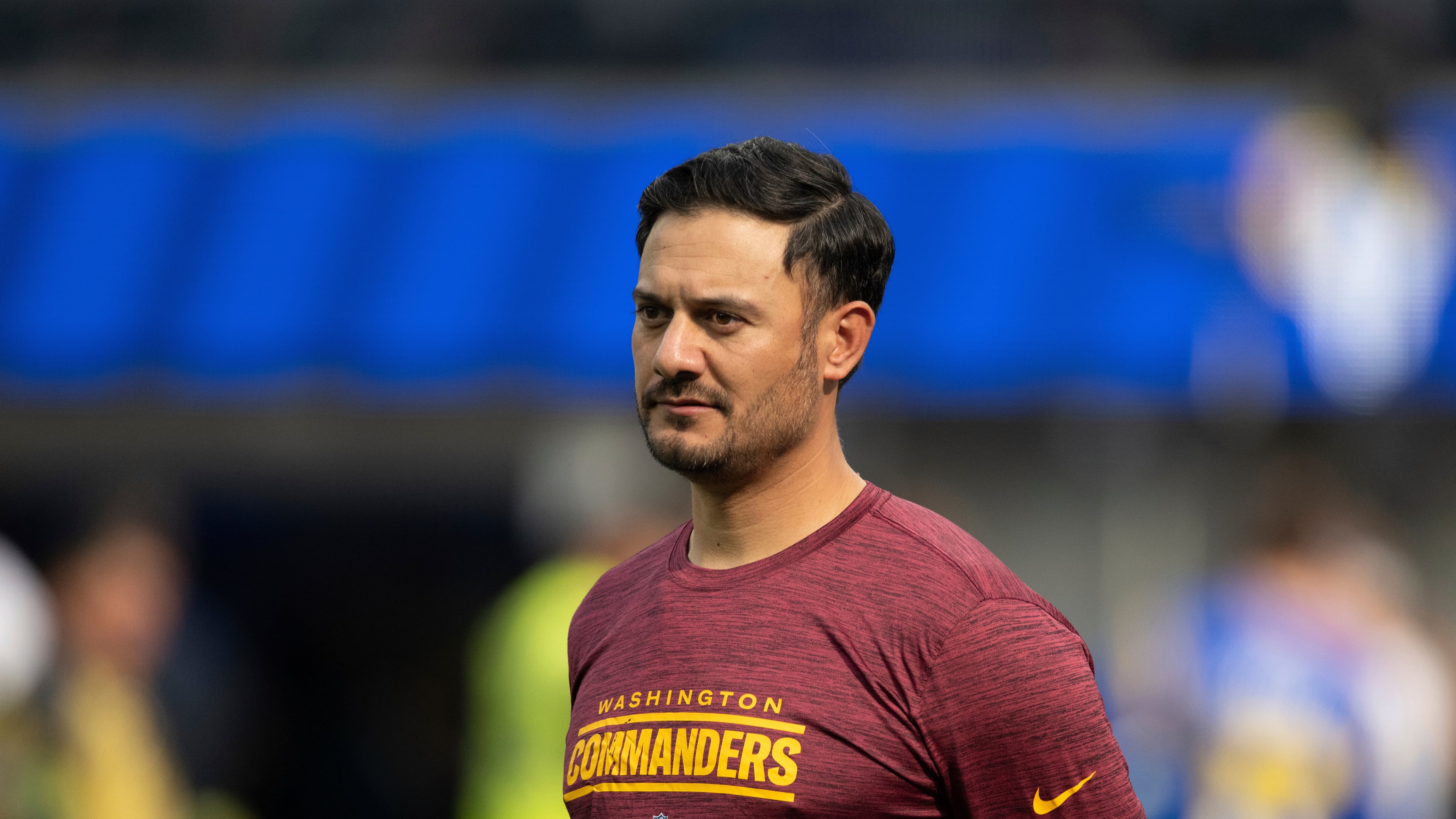 FILE - Washington Commanders quarterbacks coach Tavita Pritchard watches his players before an NFL football game against the Los Angeles Rams, Dec. 17, 2023, in Inglewood, Calif. (AP Photo/Kyusung Gong, File)