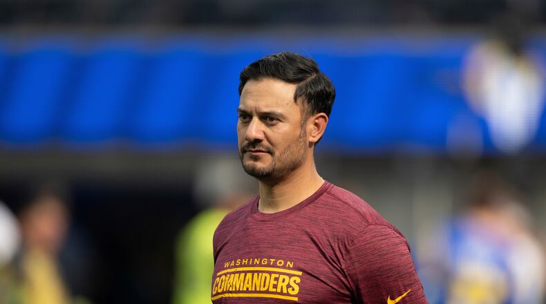 FILE - Washington Commanders quarterbacks coach Tavita Pritchard watches his players before an NFL football game against the Los Angeles Rams, Dec. 17, 2023, in Inglewood, Calif. (AP Photo/Kyusung Gong, File)