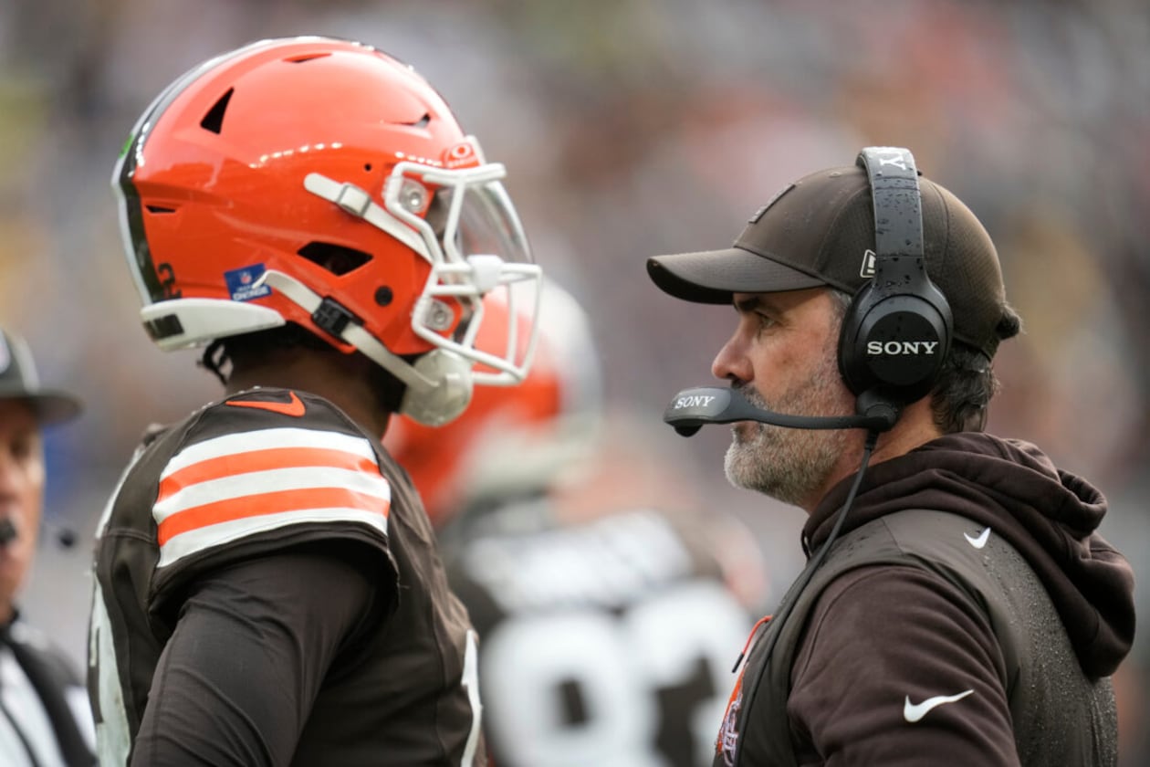 Browns coach Kevin Stefanski (right) talks with quarterback Shedeur Sanders during a game against the Steelers on Sunday, Dec. 28, 2025, in Cleveland. Sanders was one of three quarterbacks that Cleveland started in 2025. (Sue Ogrocki/AP)