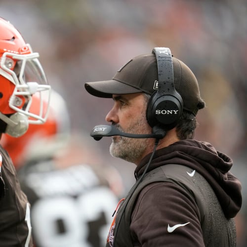 Browns coach Kevin Stefanski (right) talks with quarterback Shedeur Sanders during a game against the Steelers on Sunday, Dec. 28, 2025, in Cleveland. Sanders was one of three quarterbacks that Cleveland started in 2025. (Sue Ogrocki/AP)