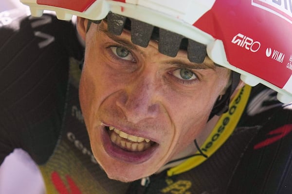 Denmark's Jonas Vingegaard crosses the finish line of the thirteenth stage of the Tour de France cycling race, an individual time-trial over 10.5 kilometers (6.5 miles) in the Pyrenees mountains with start in Loudenvielle and finish in Peyragudes, France, Friday, July 18, 2025. (AP Photo/Thibault Camus)