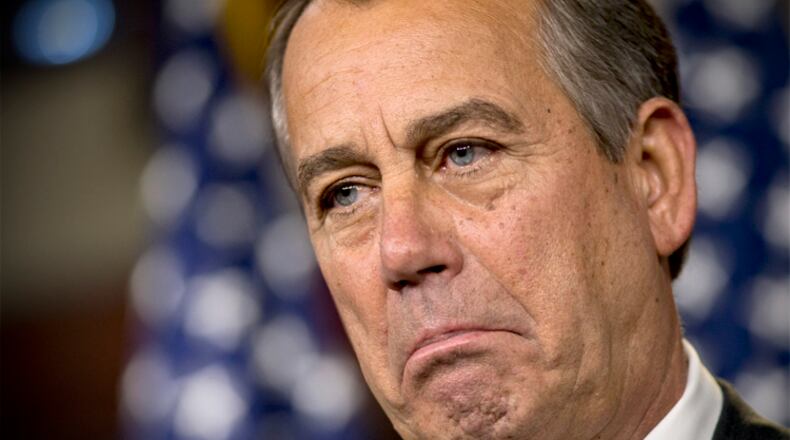 House Speaker John Boehner of Ohio pauses during a news conference on Capitol Hill in Washington, Thursday, March 21, 2013, after the Republican-controlled House passed a tea party-flavored budget plan Thursday that promises sharp cuts in safety-net programs for the poor and a clampdown on domestic agencies, in sharp contrast to less austere plans favored by President Barack Obama and his Democratic allies. (AP Photo/J. Scott Applewhite)