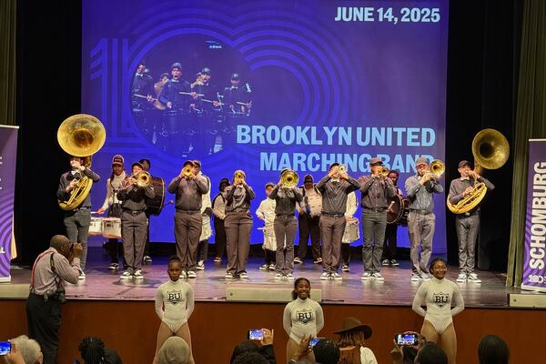Brooklyn United Marching Band performs in the Langston Hughes Auditorium celebrating the centennial of the Schomburg Center for Research in Black Culture in New York, on Saturday, June 14, 2025. (AP Photo/Jaylen Green)