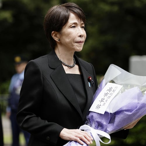 Japan’s Prime Minister Sanae Takaichi lays flowers during her visit to the Chidorigafuchi National Cemetery as the country marks the 81st anniversary of its surrender in the World War II, in Tokyo, Saturday, Aug. 15, 2026. (Juntaro Yokoyama/Kyodo News via AP)