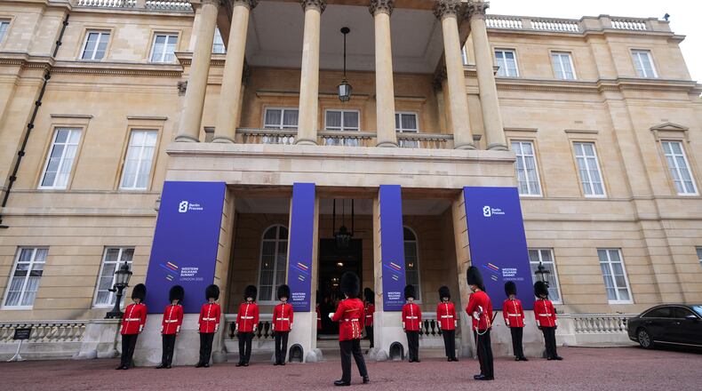 Members of the armed forces prepare for the arrival of leaders of six Western Balkan nations and British and European officials for a Western Balkans Summit in London, Wednesday, Oct. 22, 2025.(AP Photo/Kirsty Wigglesworth, Pool)