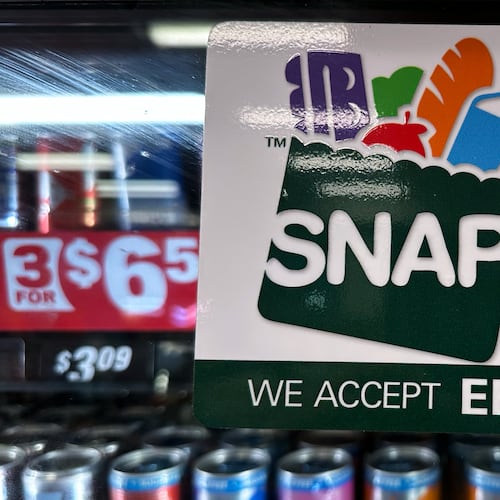 FILE - SNAP EBT information sign is displayed at a gas station in Riverwoods, Ill., Saturday, Nov. 1, 2025. (AP Photo/Nam Y. Huh, file)