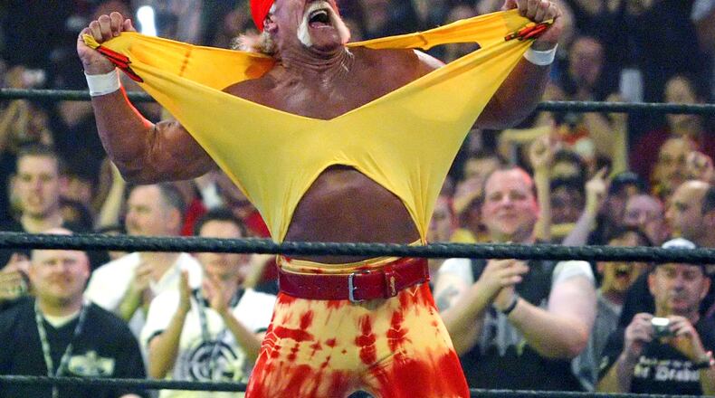 FILE - Famed wrestler Hulk Hogan fires up the crowd between matches during WrestleMania 21 in Los Angeles, April 3, 2005. (AP Photo/Chris Carlson, File)