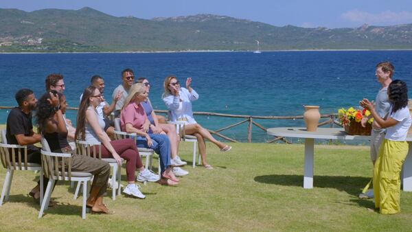 Hosts Matthew Lawrence and Chilli oversee a flower making challenge for the five couples on the beach in Sardinia, Italy. “We really got to like the couples,” Lawrence says. “We couldn’t help but root for them.” (Hallmark+)