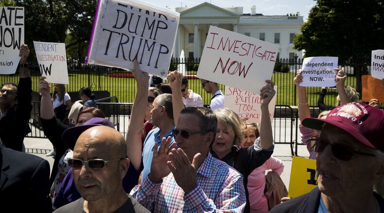 Demonstrators protest in reaction to President Donald Trump’s firing of FBI Director James Comey, outside the White House, in Washington, May 10, 2017. (Doug Mills/The New York Times)