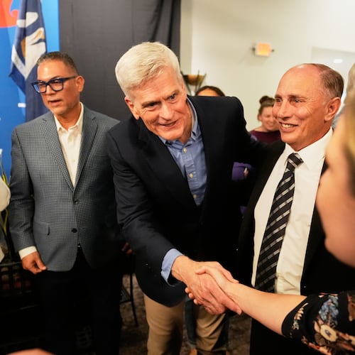 U.S. Sen. Bill Cassidy, R-La., greets supporters at a campaign stop at Drago's Restaurant Tuesday, May 5, 2026, in Metairie, La. (AP Photo/Gerald Herbert)