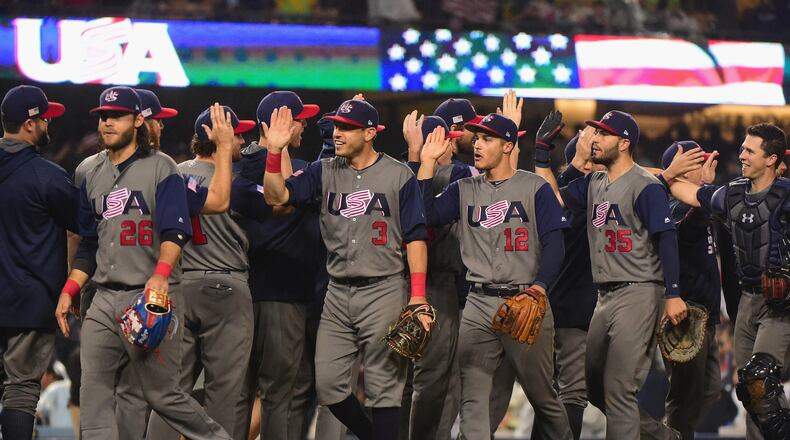 Team United States celebrate their 2-1 win over team Japan at the end of the ninth inning in Game 2 of the Championship Round of the 2017 World Baseball Classic at Dodger Stadium on March 21, 2017 in Los Angeles, California.