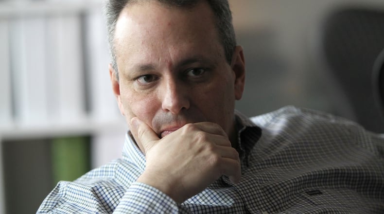Rob Frohwein, a co-founder of Kabbage, poses in their office in midtown. Kabbage is an online lender to small businesses, and lenders like Kabbage have grown into $1 billion-plus businesses. TAYLOR CARPENTER / TAYLOR.CARPENTER@AJC.COM