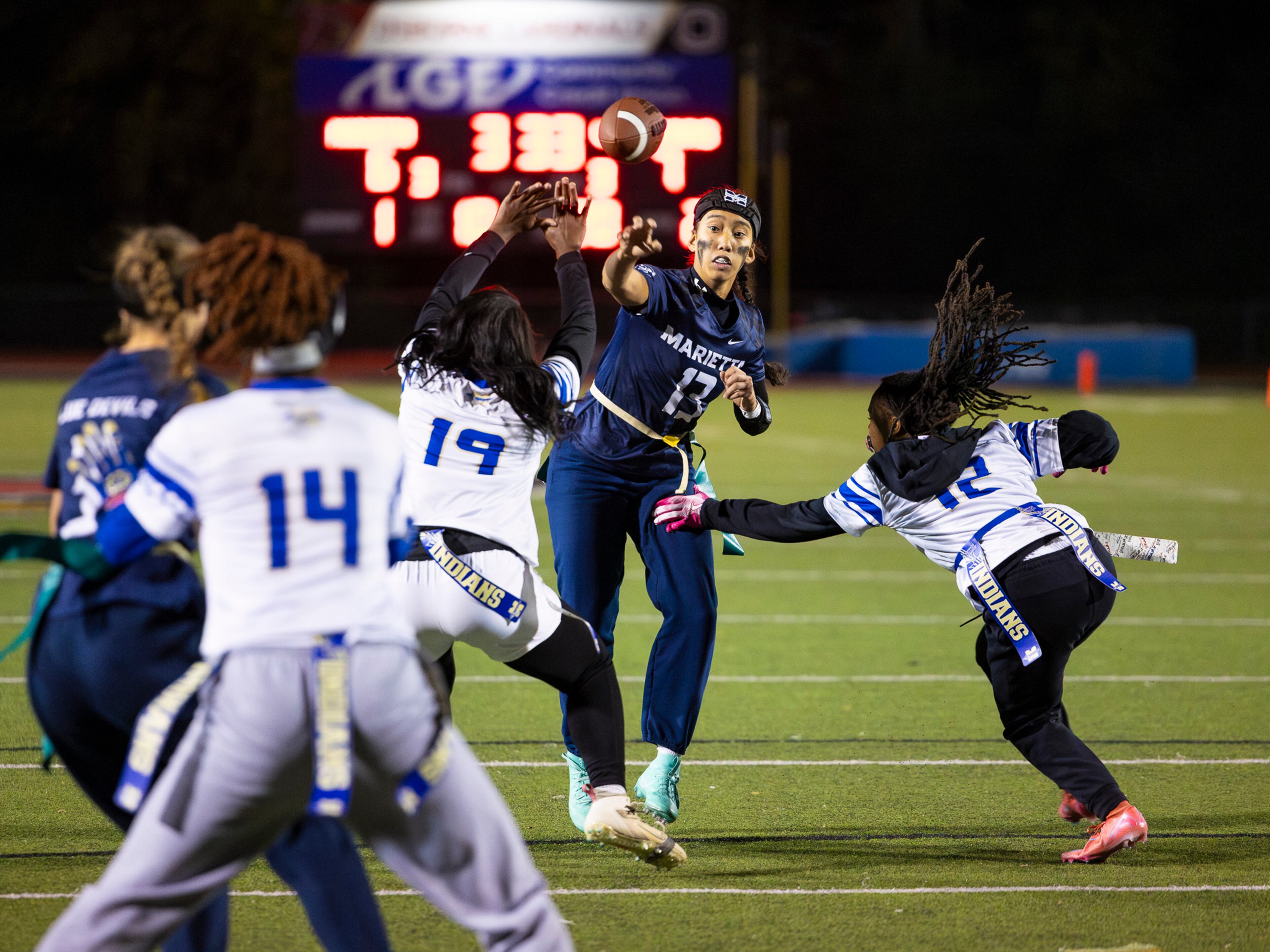 Marietta's Kaylee Wang (13) throws the ball in a flag football game against McEachern at Osborne High School in Marietta, GA on Monday, November 17th, 2025. (Oscar Guevara Saenz for the AJC)