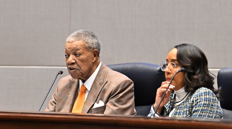 Robb Pitts (left) speaks as Mo Ivory listens during a meeting at the Fulton County Government Center on Wednesday, Feb. 4, 2026, in Atlanta. Pitts has been chairman of the Fulton County Commission since 2017. (Hyosub Shin/AJC)