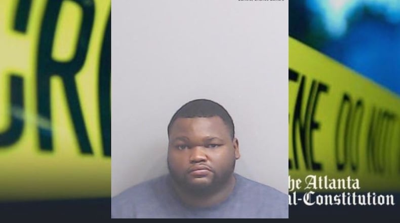 Charles Edward Carlisle, 28, was arrested Tuesday and charged with murder.