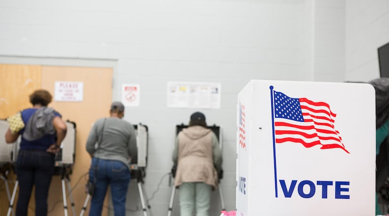 In this file photo, voters cast ballots during the early voting period at C.T. Martin Natatorium and Recreation Center on October 18, 2018 in Atlanta, GA. (Jessica McGowan/Getty Images/TNS)