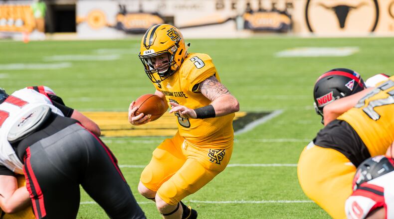 Kennesaw State quarterback Chandler Burks eyes a hole near the goal line. (Special by Cory Hancock)