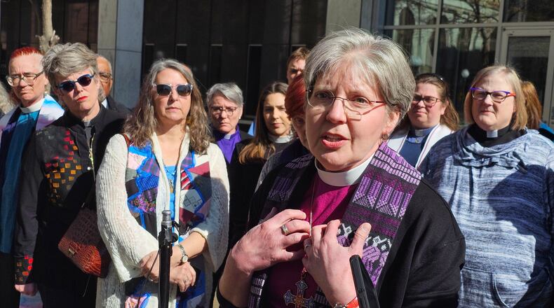 Bishop Jennifer Nagel, of the Minneapolis Synod of the Evangelical Lutheran Church in America, speaks to reporters outside the federal courthouse in St. Paul, Minn., on Friday, March 20, 2026, after a federal judge ruled that clergy will be allowed to minister to immigrants in a holding facility at the headquarters of the Trump administration's enforcement surge in Minnesota. (AP Photo/Steve Karnowski)