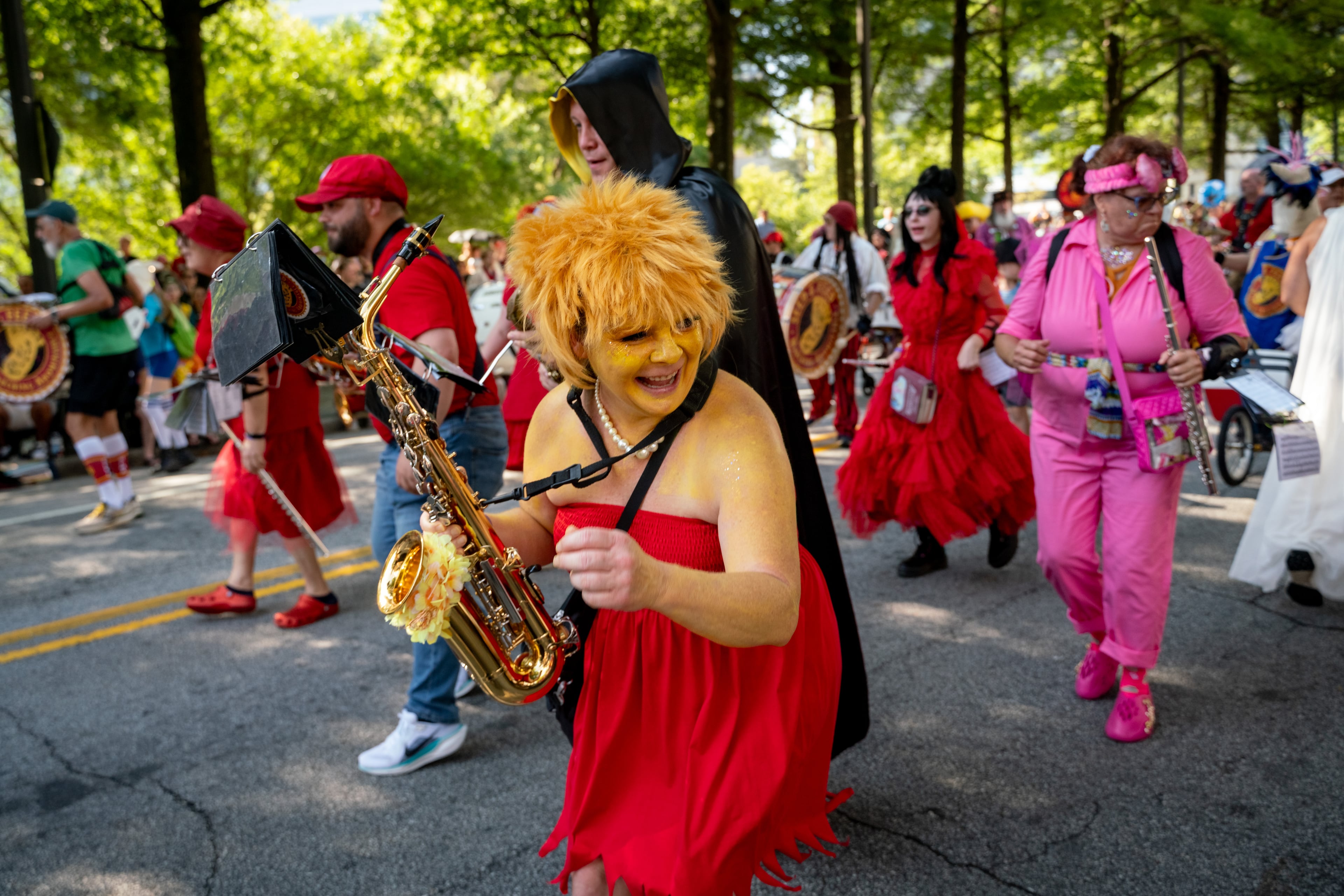Thousands lined up along Peachtree Street on Saturday morning, August 31, 2024, for the annual Dragon Con parade in Atlanta. (Ben Hendren for The Atlanta Journal-Constitution)