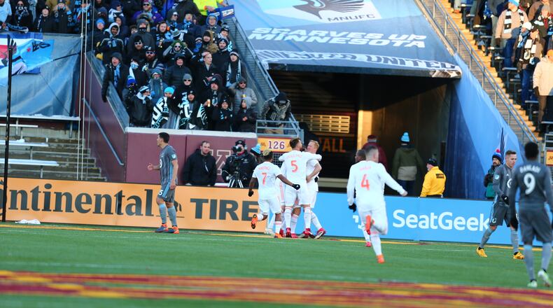 Atlanta United players celebrate the opening goal at Minnesota United on Saturday. (Atlanta United)