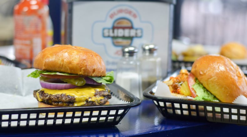 The Original Big Joint Burger with double patties at Sliders Burger Joint is a meal unto itself. The burger comes with one patty, but you can make it a double for $2 more. CONTRIBUTED BY HENRI HOLLIS