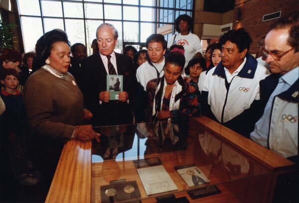 As part of Atlanta's bid to host the Olympics, Coretta Scott King in April, 1990, showed members of the International Olympic Committee the medals in which her husband, Dr. Martin Luther King won during his life time. The IOC awarded the bid to Atlanta the following September. (Johnny Crawford/AJC staff)
