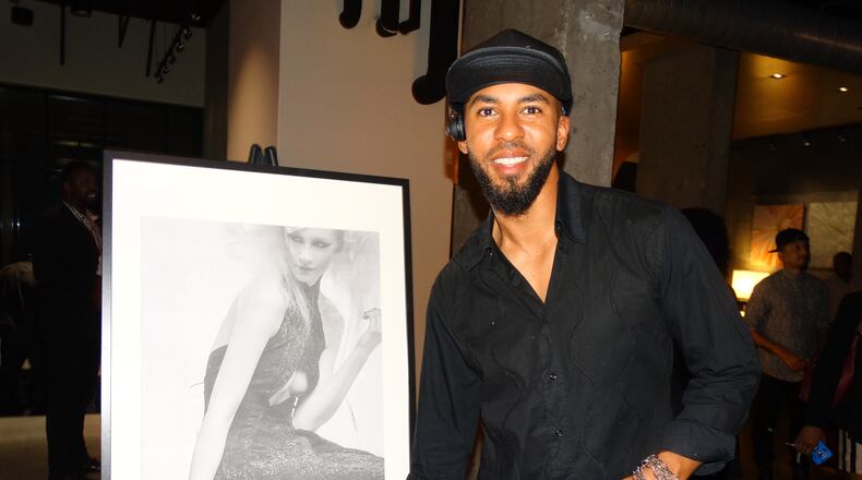 Edmond Newton was in good spirits at his viewing party despite not winning "Project Runway" Thursday night at Aloft Downtown. CREDIT: Rodney Ho/ rho@ajc.com