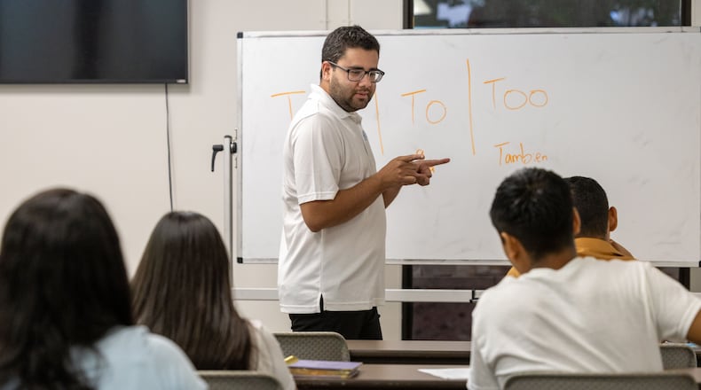 Miguel Hernandez teaches a class at the Institudo de Las Americas. He co-founded a language school for Latino immigrants to give them an affordable in-class opportunity to learn English. PHIL SKINNER FOR THE ATLANTA JOURNAL-CONSTITUTION