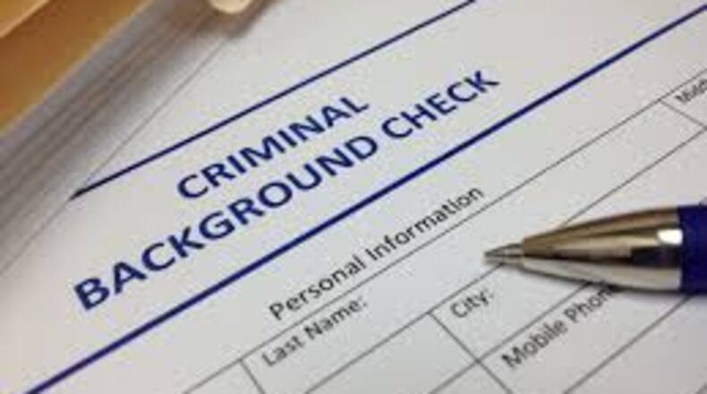 Background checks are common for people applying for jobs, promotions, apartments and loans. The checks often have information about interactions with the justice system, but there are limits on what a report can include. (File Photo)