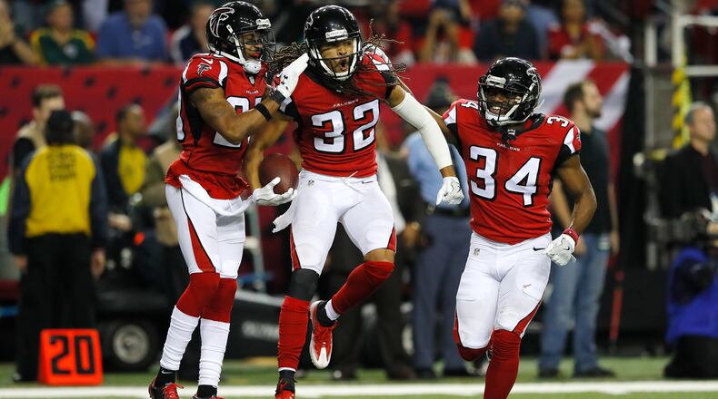 ATLANTA, GA - JANUARY 22: Jalen Collins #32 of the Atlanta Falcons is congratulated by his teammates against the Green Bay Packers during the third quarter in the NFC Championship Game at the Georgia Dome on January 22, 2017 in Atlanta, Georgia. (Photo by Kevin C. Cox/Getty Images)