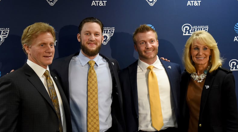 The Los Angeles Rams hired former Atlantan and Marist High School quarterback Sean McVay (second from right) as their new football coach last January. With him were (from left) father Tim McVay, brother Ryan McVay, and mother Cindy McVay .