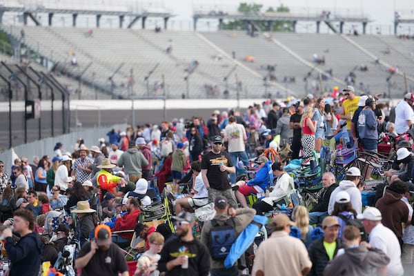 Fans congregate before the start of the Indianapolis 500 auto race at Indianapolis Motor Speedway in Indianapolis, Sunday, May 25, 2025. (AP Photo/AJ Mast)