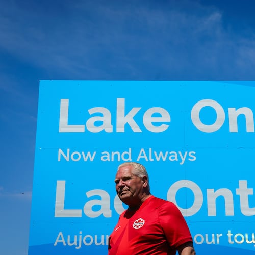 Ontario Premier Doug Ford unveils a sign for Lake Ontario at Fifty Point Conservation Area in Grimsby, Ontario, Canada, on Saturday, Aug. 29, 2026. (Keito Newman/The Canadian Press via AP)