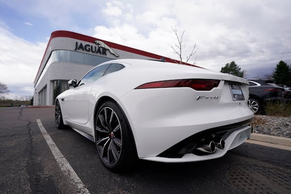 An unsold 2021 F-Type coupe sits at a Jaguar dealership in this photograph taken May 2, 2021, in Littleton, Colorado. (David Zalubowski/AP)
