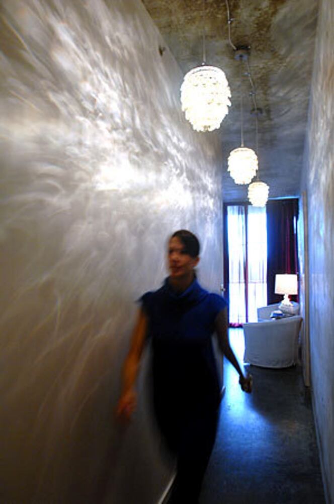 TV crew warms up Tribute Lofts unit
