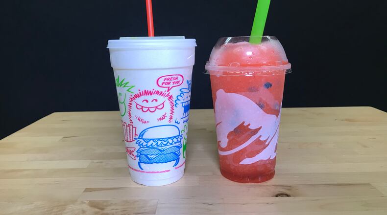 Pickle Juice Slsuh from Sonic (lefft) and Watermelon Freeze from Taco Bell