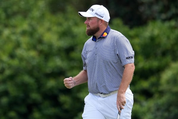 Shane Lowry, of Ireland, celebrates after a birdie on the 11th hole during the second round at the Masters golf tournament, Friday, April 11, 2025, in Augusta, Ga. (AP Photo/Matt Slocum)