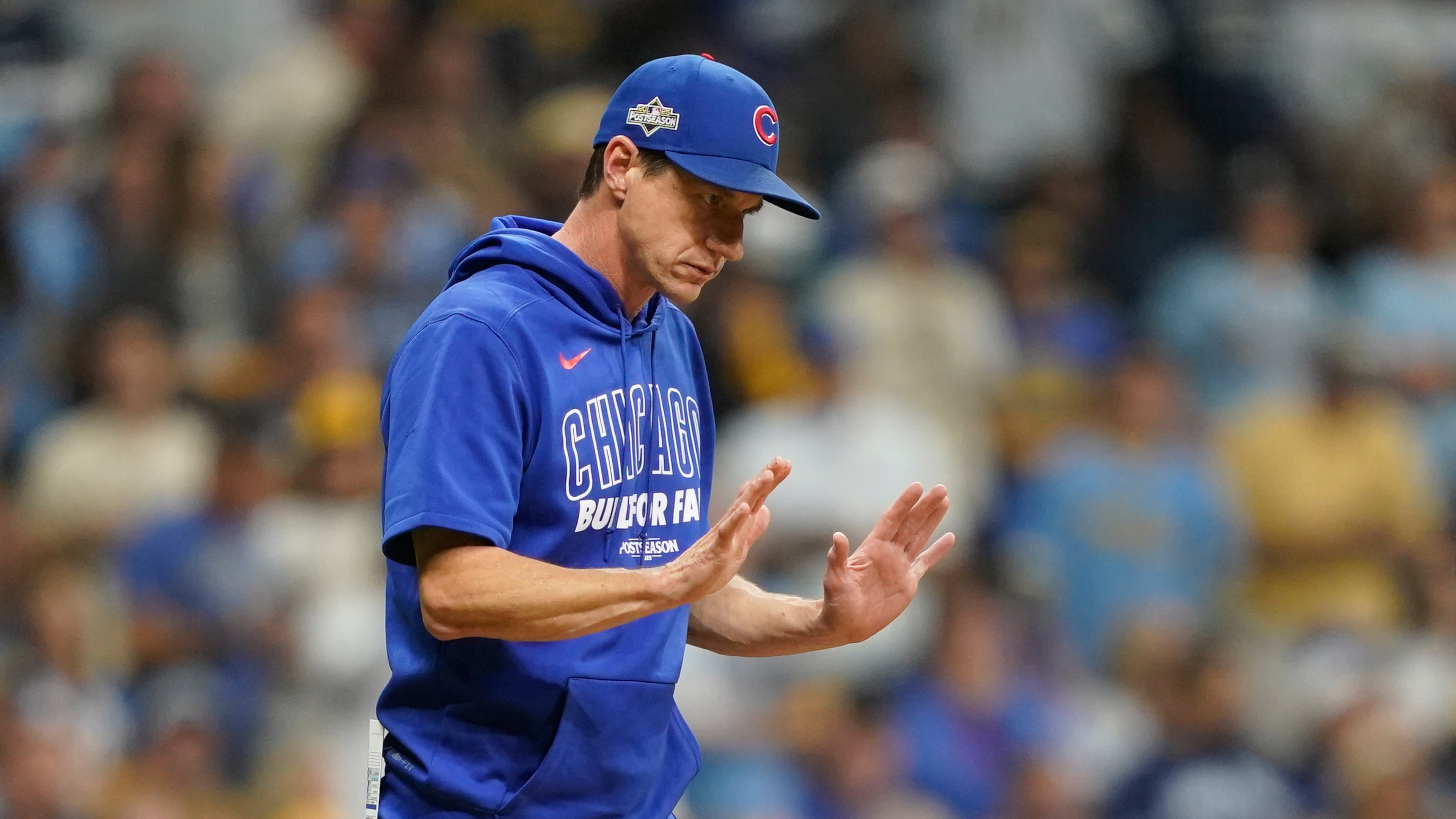Chicago Cubs manager Craig Counsell comes to the mound to make a pitching change during the third inning of Game 2 of baseball's National League Division Series against the Milwaukee Brewers Monday, Oct. 6, 2025, in Milwaukee. (AP Photo/Kayla Wolf)