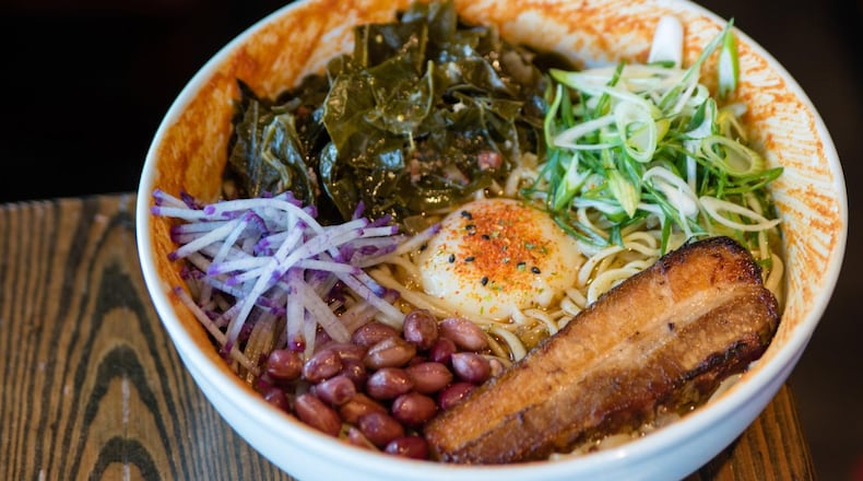 The beautiful Southern Ramen at BoccaLupo is packed with eye-popping colors and rimmed with Hozon, a spicy condiment based on miso. CONTRIBUTED BY HENRI HOLLIS