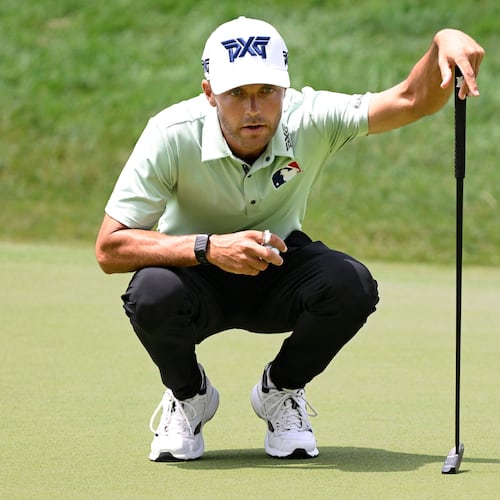 Eric Cole lines up his putt on the 18th green during the first round of the Travelers Championship golf tournament at TPC River Highlands, Thursday, June 25, 2026, in Cromwell, Conn. (AP Photo/Jessica Hill)