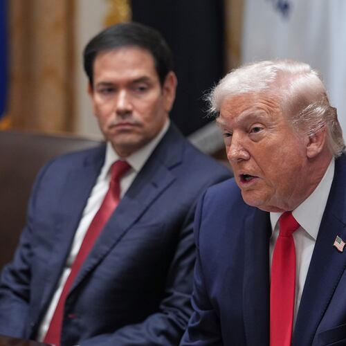 President Donald Trump speaks as Secretary of State Marco Rubio listens during a cabinet meeting at the White House, Thursday, Jan. 29, 2026, in Washington. (AP Photo/Evan Vucci)